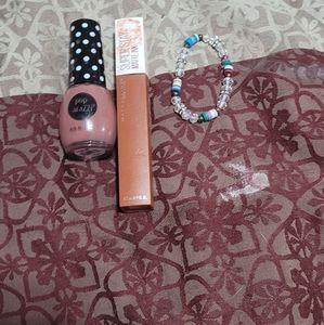 A note Polish And a lipstick And a bracelet